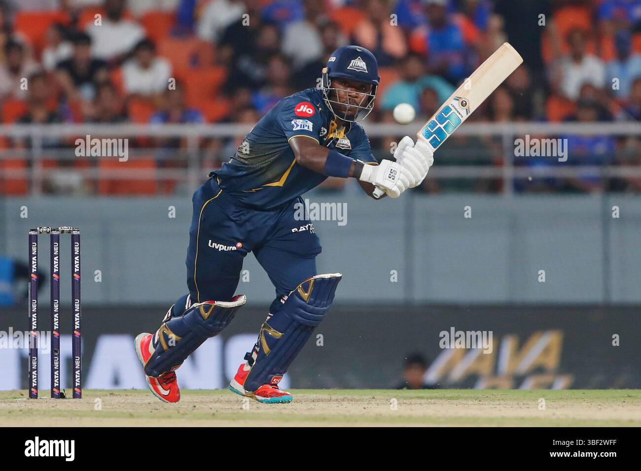 Gujarat Titans' Sherfane Rutherford plays a shot during the Indian ...