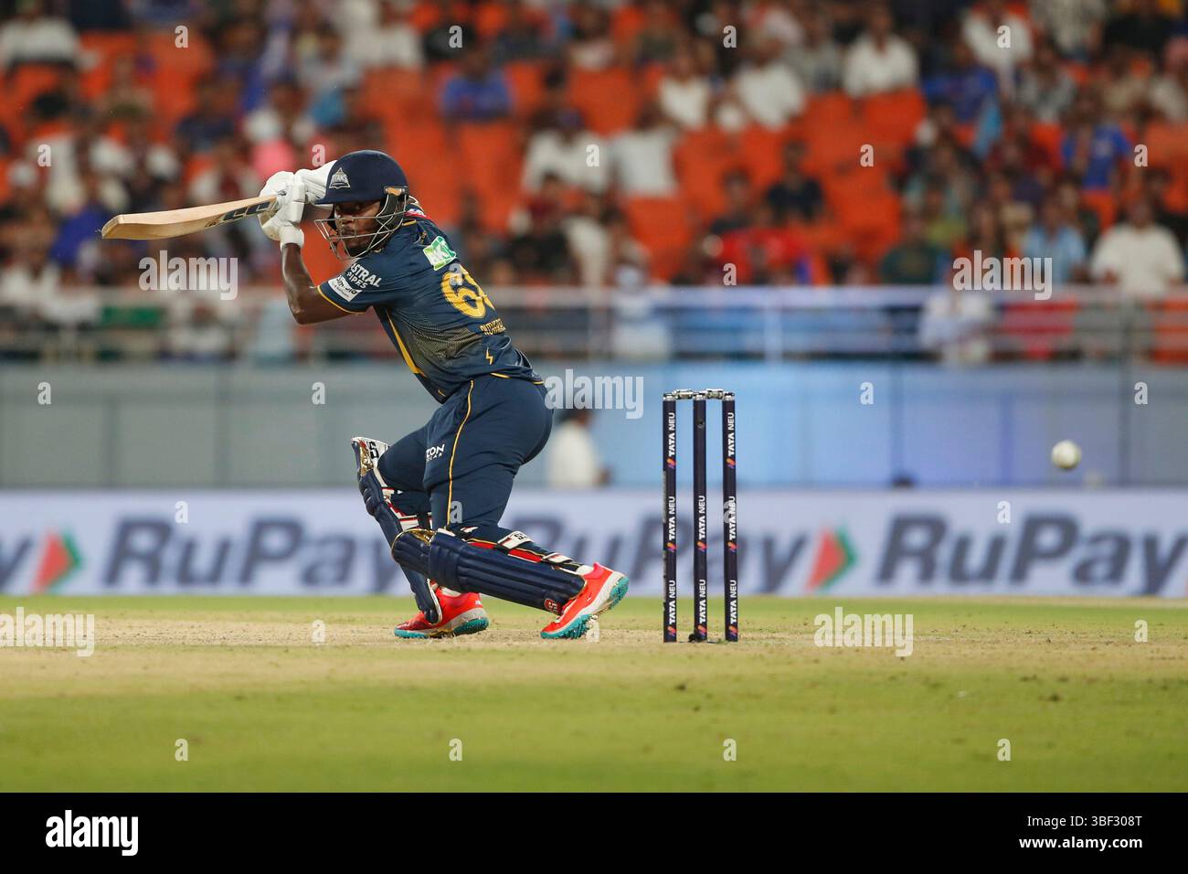 Gujarat Titans' Sherfane Rutherford plays a shot during the Indian ...