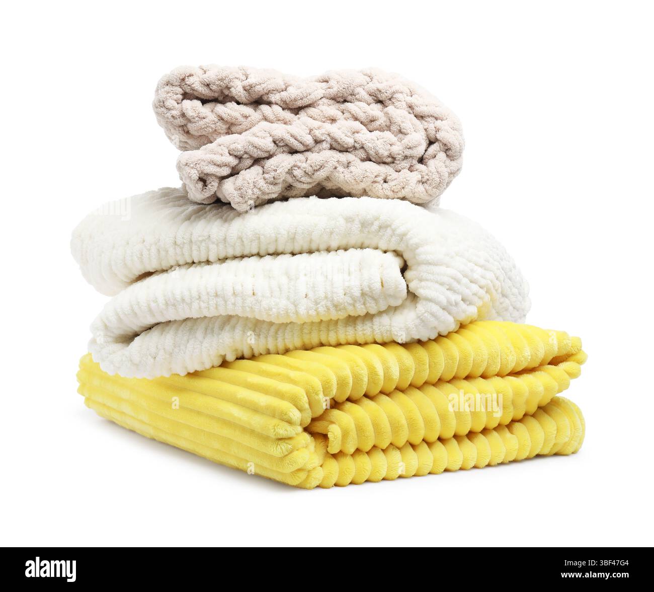 Stack of folded blankets isolated on white Stock Photo