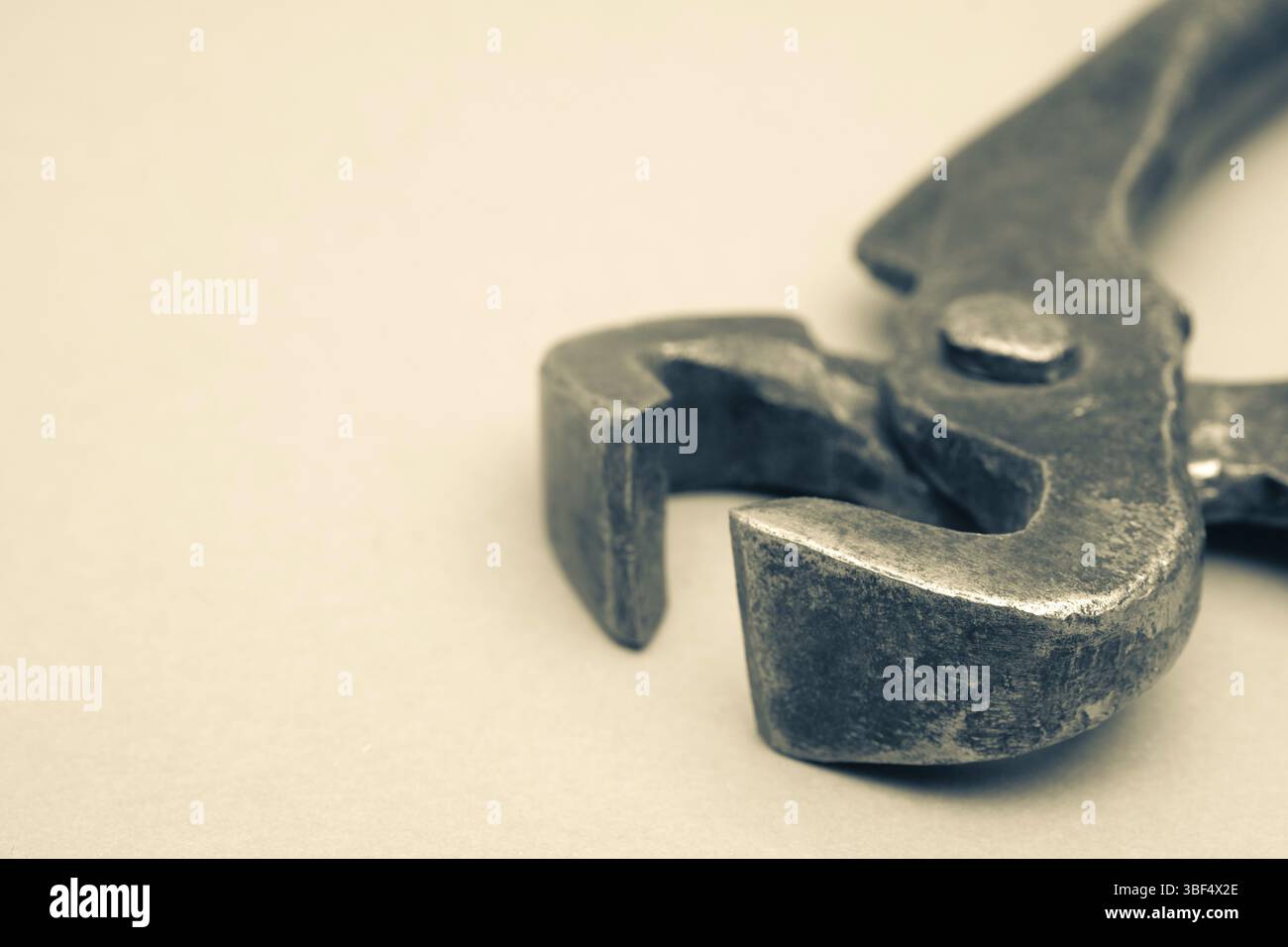 Tools for pulling nails - old metal pliers Stock Photo