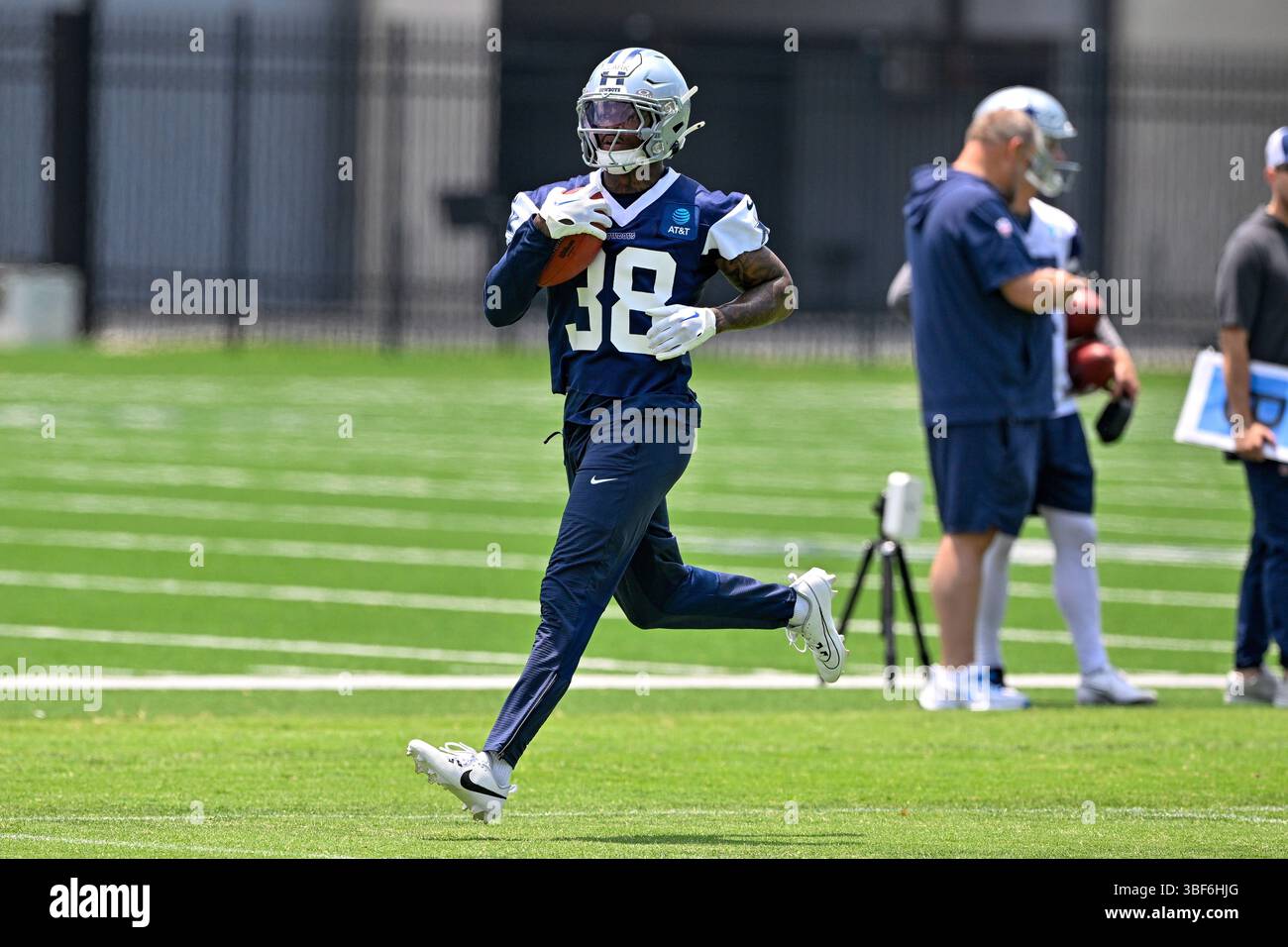 Dallas Cowboys safety Alijah Clark runs with the ball during NFL ...