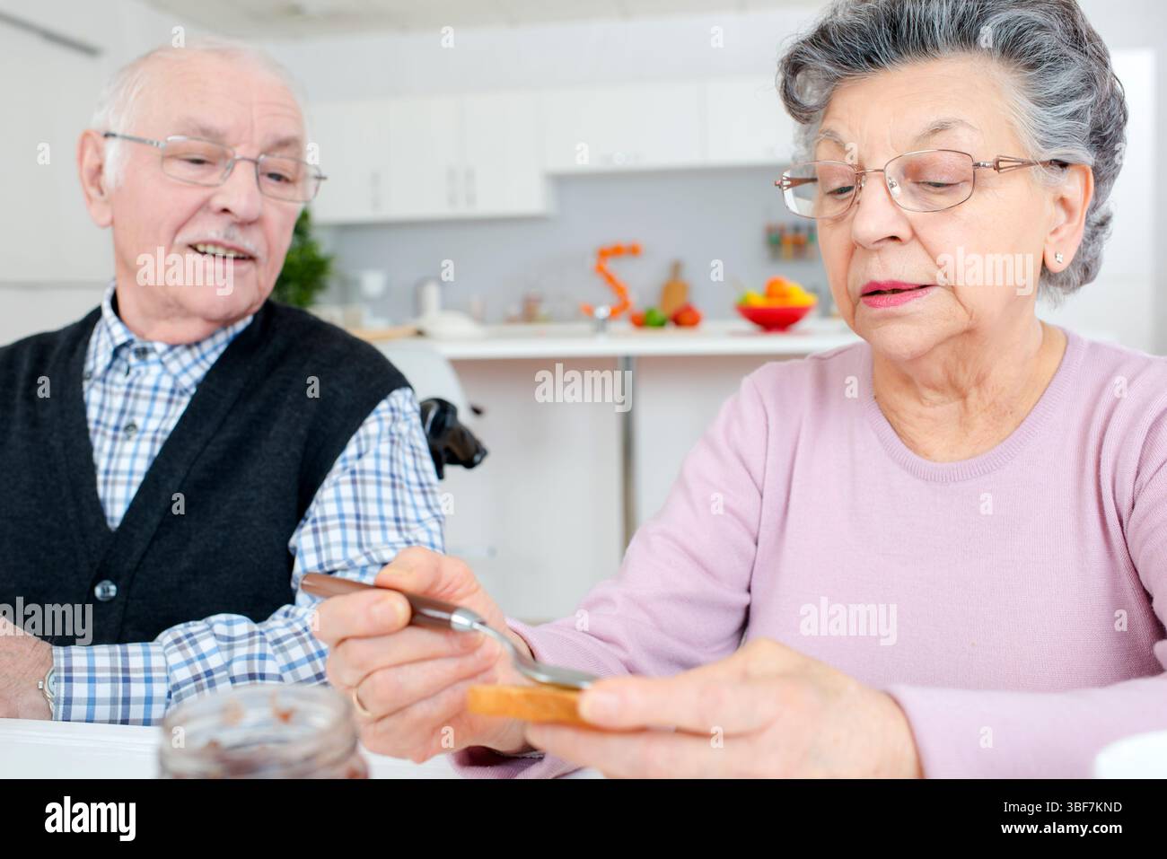happy senior couple having breakfast Stock Photo