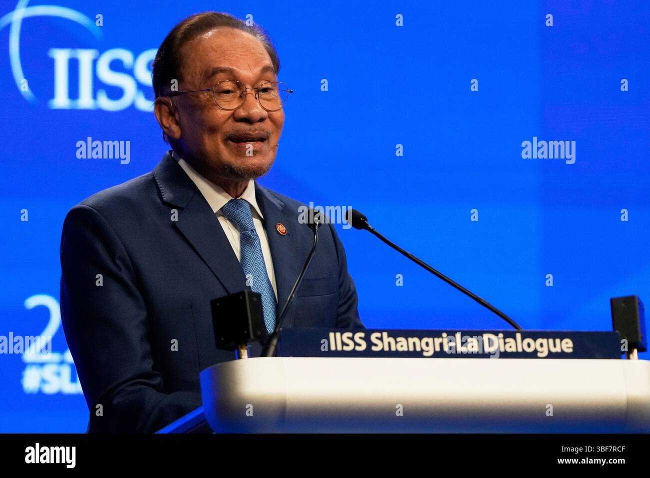 Malaysian Prime Minister Anwar Ibrahim delivers his speech during the