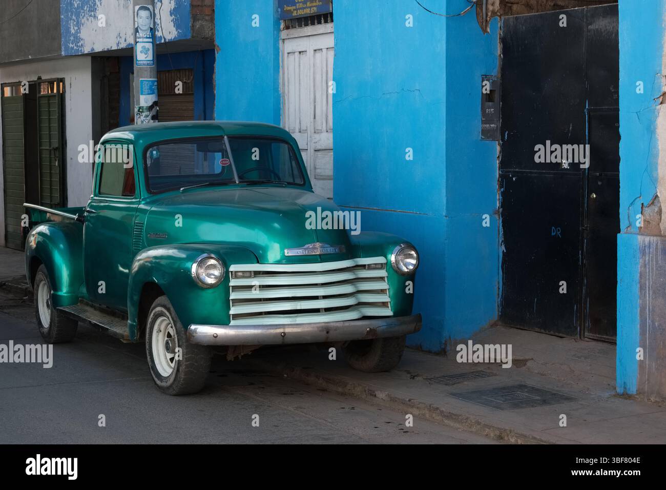 Classic vintage green Chevrolet 3100 pickup truck parked in a street in ...