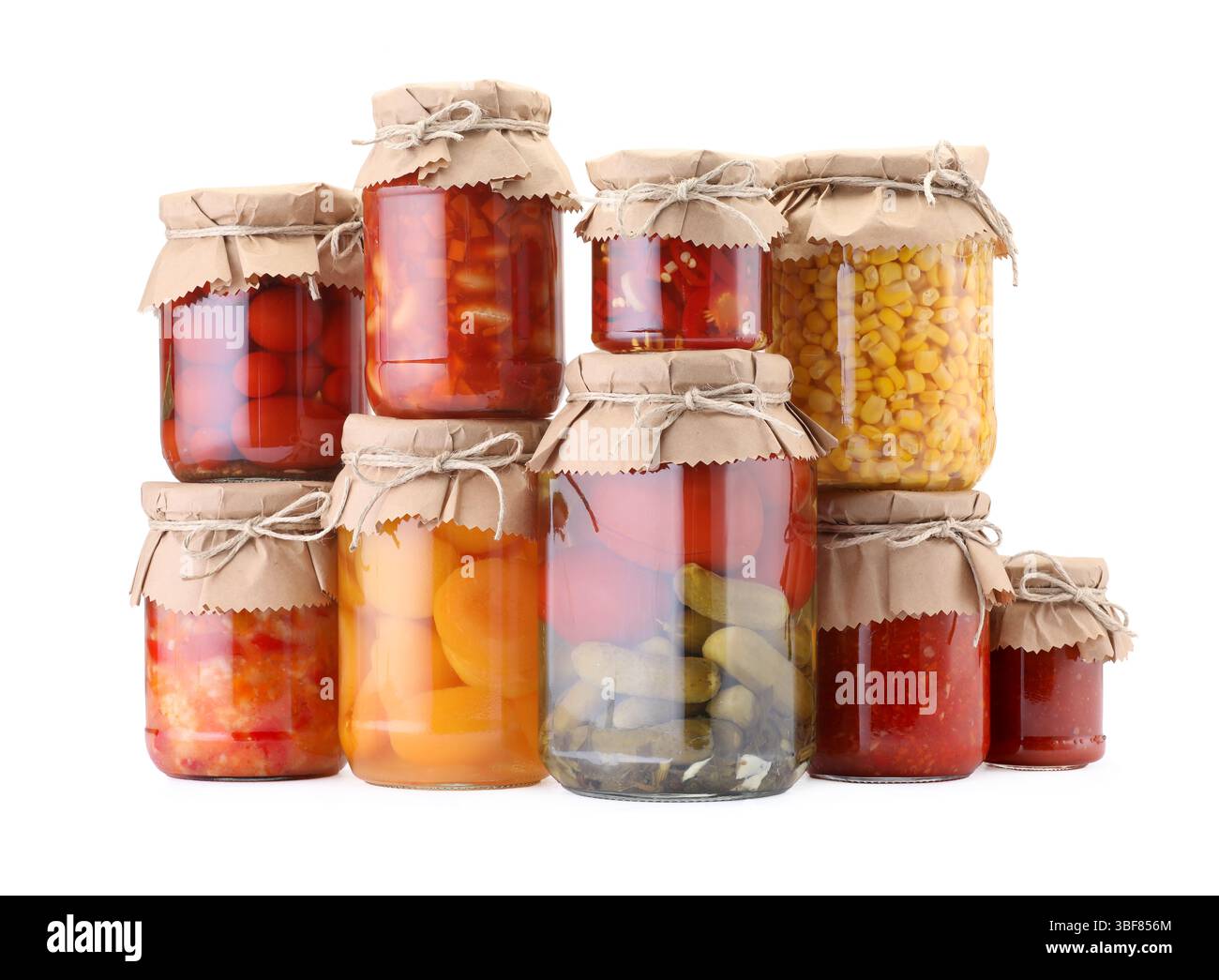 Many jars with different pickled products isolated on white Stock Photo