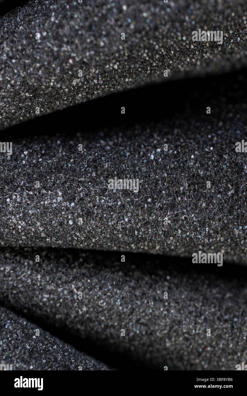 foam for packaging of objects and products, foamy soft foam for giving elasticity to objects or sound insulation or as a packaging material, closeup Stock Photo