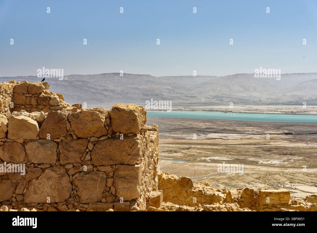 The Dead Sea from Masada, Israel  The Dead Sea has attracted visitors from around the Mediterranean basin for thousands of years. It was one of the world's first health resorts, and it has been the supplier of a wide variety of products, from asphalt for Egyptian mummification to potash for fertilisers. Today, tourists visit the sea on its Israeli, Jordanian and West Bank coastlines Stock Photo