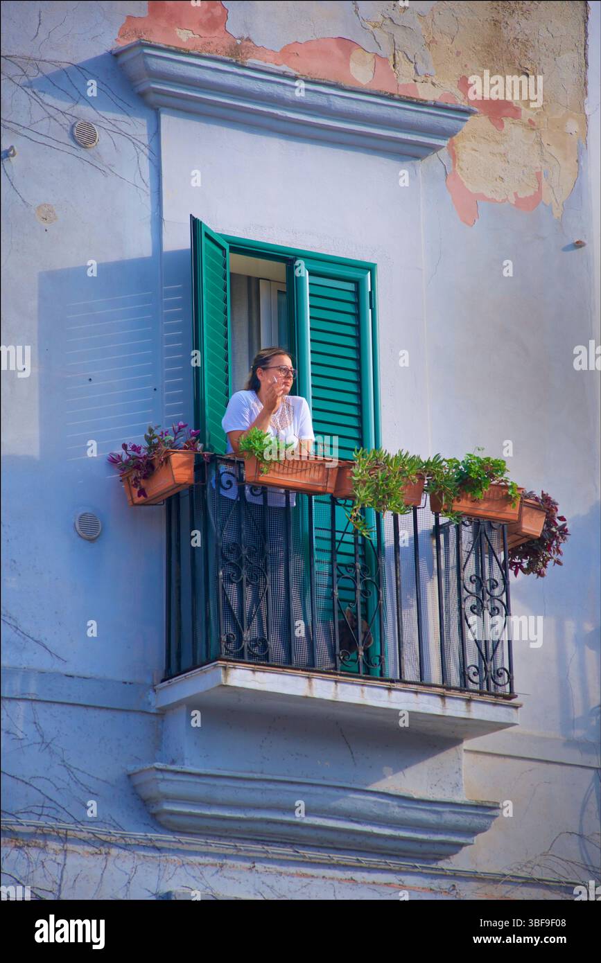 Smoking on a balcony hi-res stock photography and images