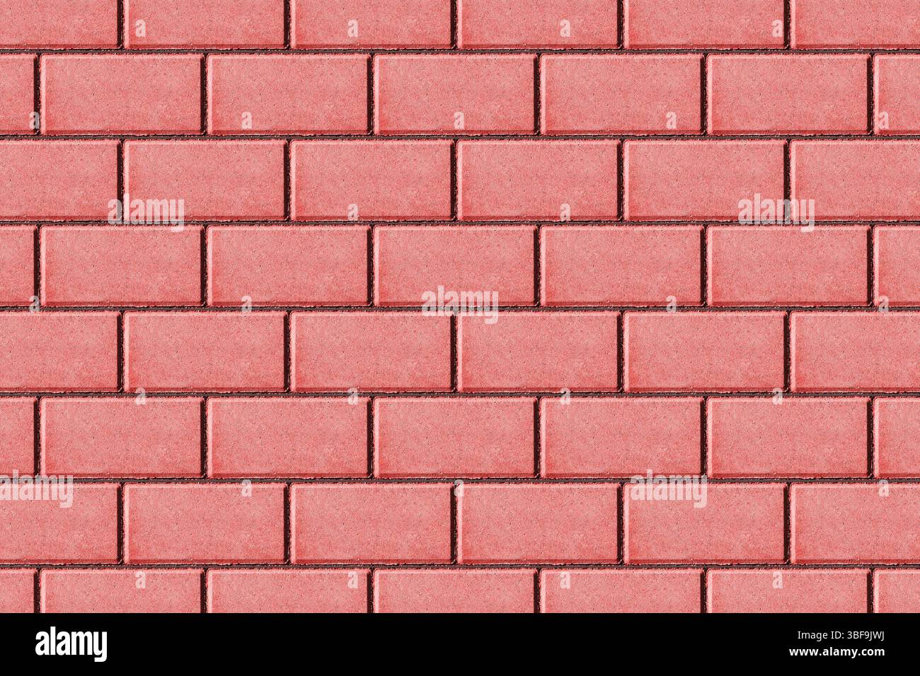 Red brick wall background. Classic bricks pattern. Construction material surface. Textured rectangular brick blocks. Urban architecture. Stock Photo