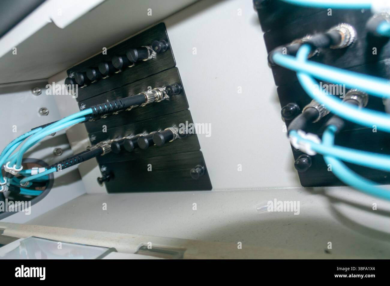 This image showcases intricate electrical wiring inside an equipment