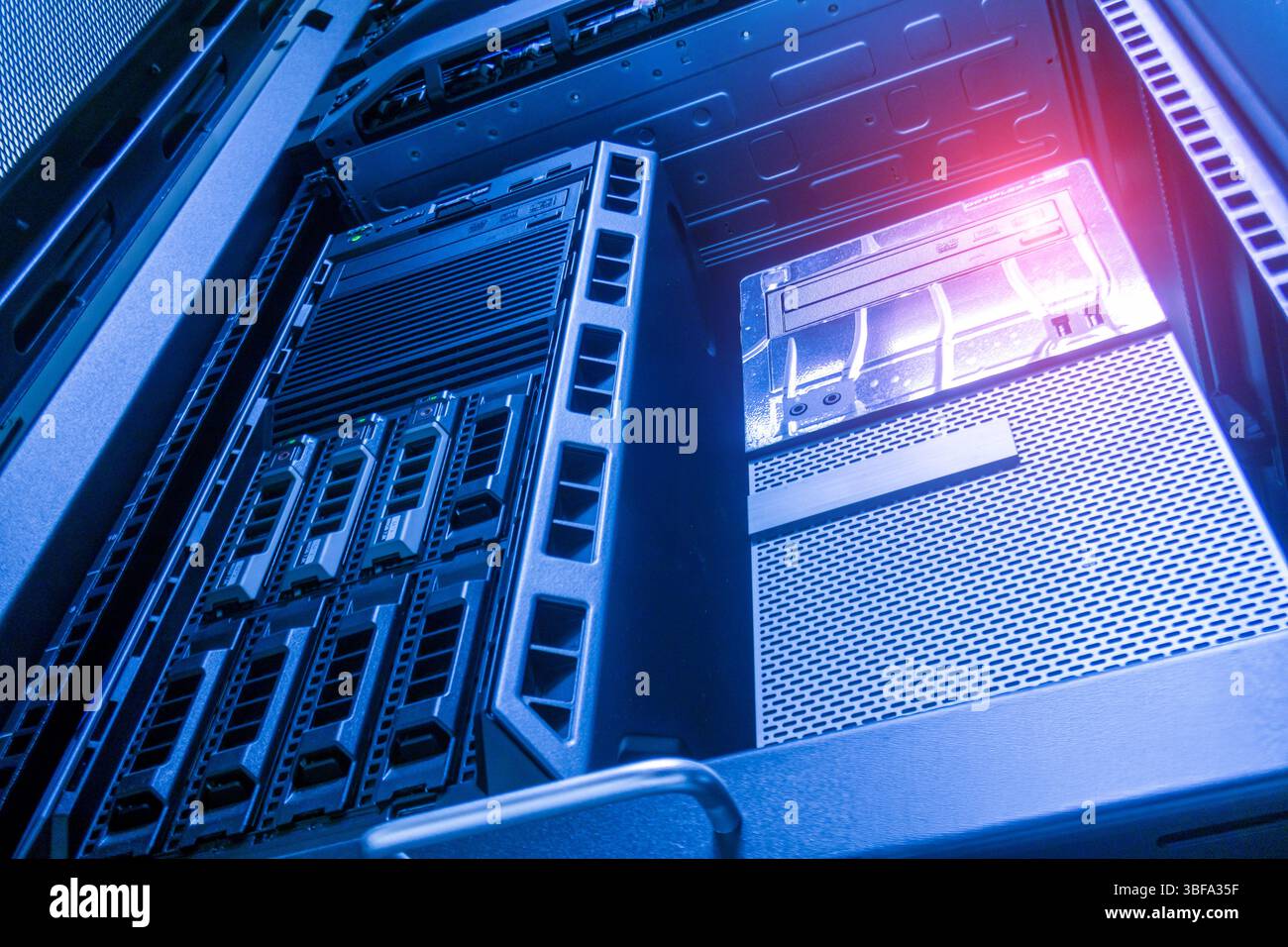 A close-up view of a server rack showcasing multiple storage units and ...