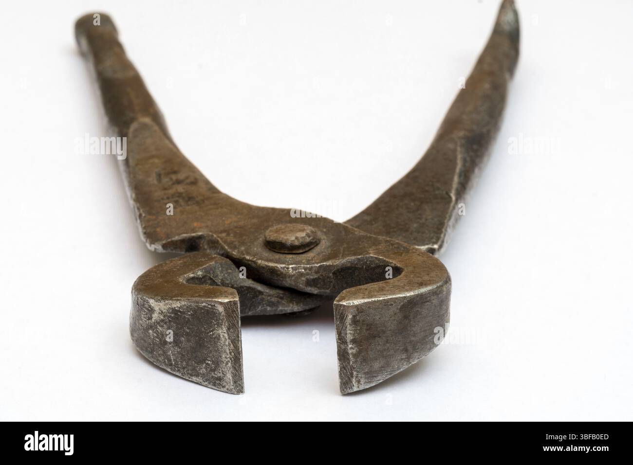 Tools for pulling nails - old metal pliers Stock Photo