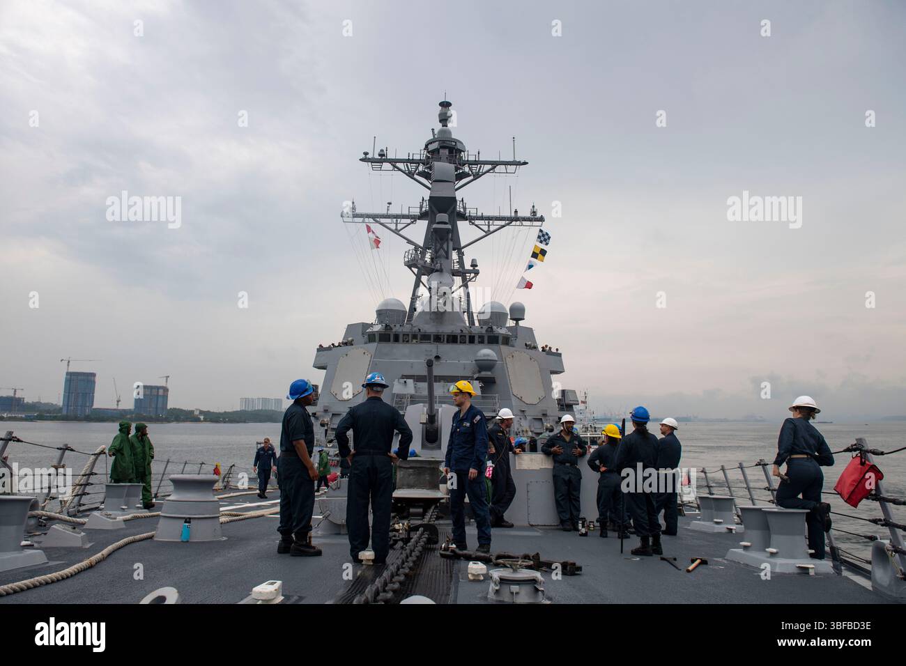 Sailors muster for a sea-and-anchor detail on the fo’c’sle of the ...