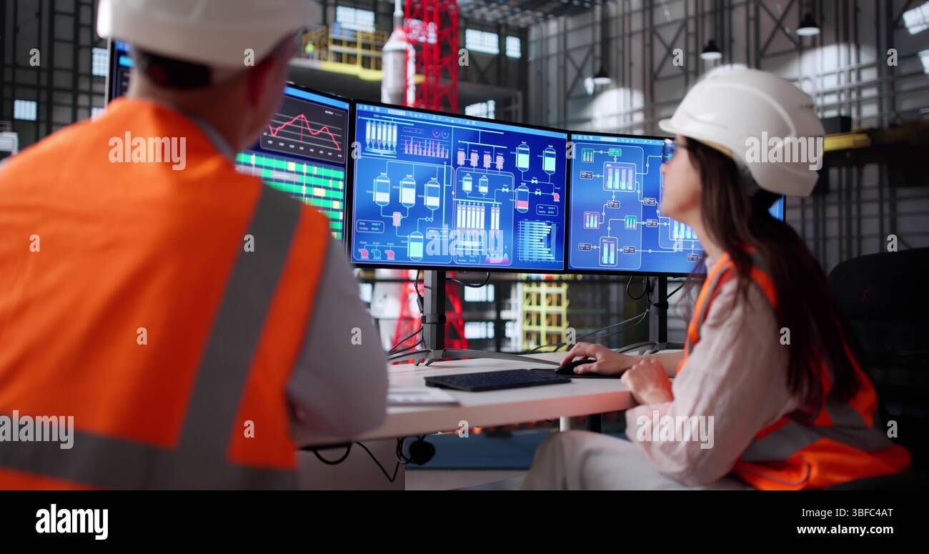 Team Of Engineers Using Scada To Control Moon Exploration Program Stock Photo