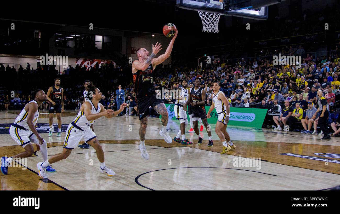 Vancouver's Mitch Creek (55) lays up for 2 points behind the Edmonton defence during the game between Edmonton Stingers and Vancouver Bandits at Edmonton Expo Centre. Final scores; Edmonton Stingers 95-104 Vancouver Bandits. (Photo by Ron Palmer / SOPA Images/Sipa USA) Stock Photo