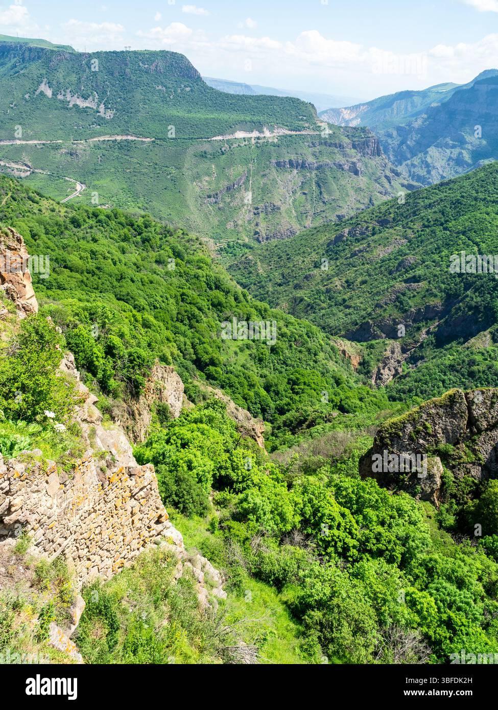 above view of green gorge of Vorotan river from Tatev Monastery in Syunik Province of Armenia on sunny May morning Stock Photo