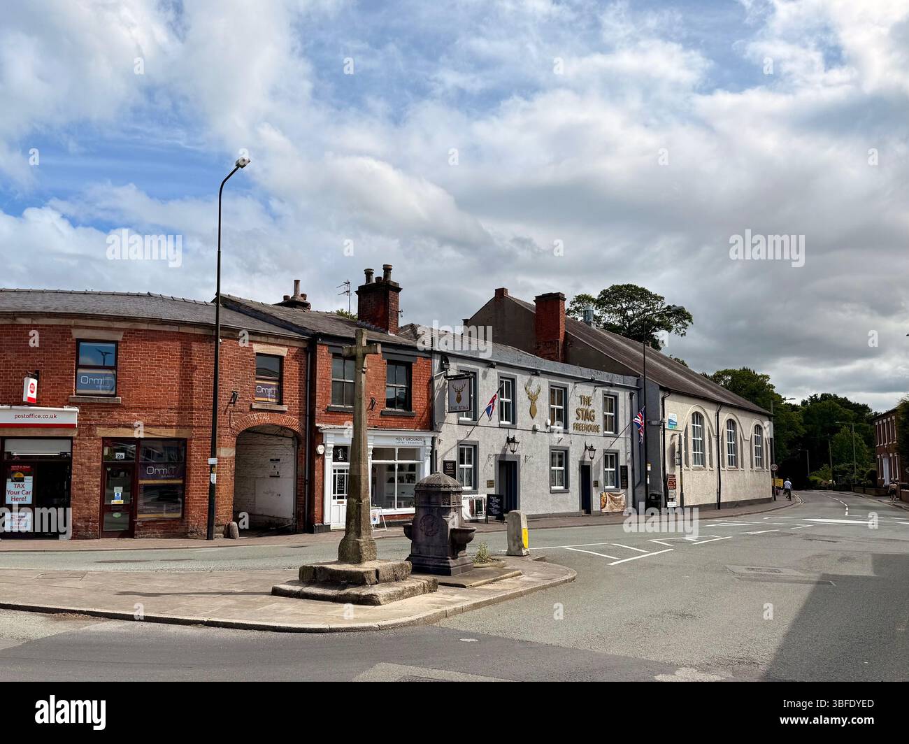 Medieval cross and drinking well on Towngate (Worden Lane)in Leyland, Lancashire - Smartphone Captured Stock Image