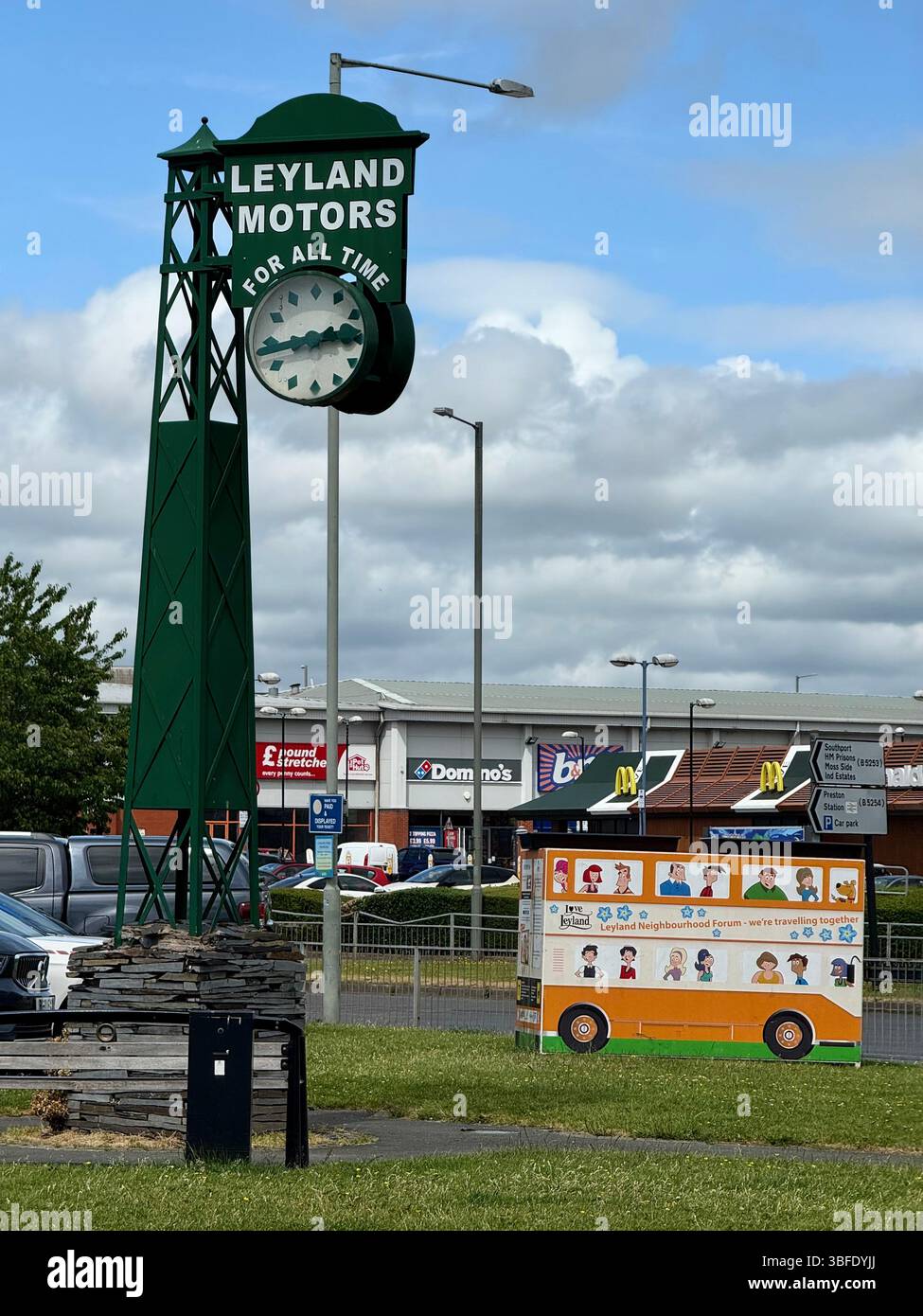 Leyland Motors clock on road junction in Leyland, Lancashire - Smartphone Captured Stock Image