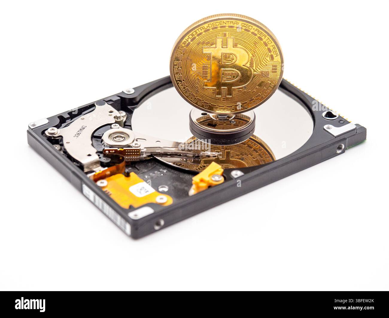 Coin of bitcoin with HDD. Mining Cryptocurrency coin on HDD Stock Photo -  Alamy