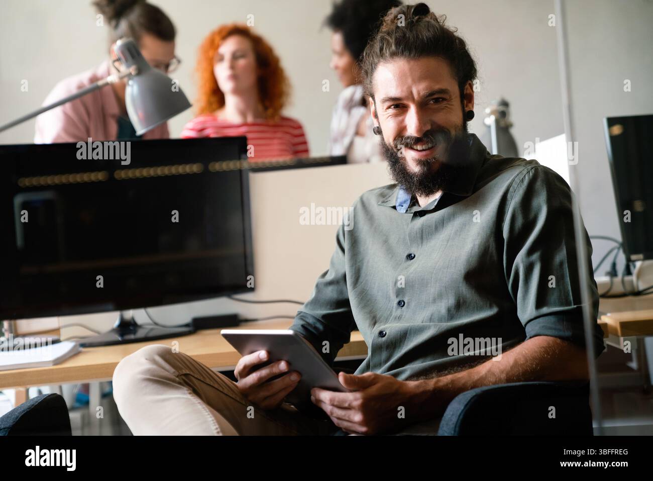 Success business man with tablet, analytics and developer for startup business website IT software Stock Photo