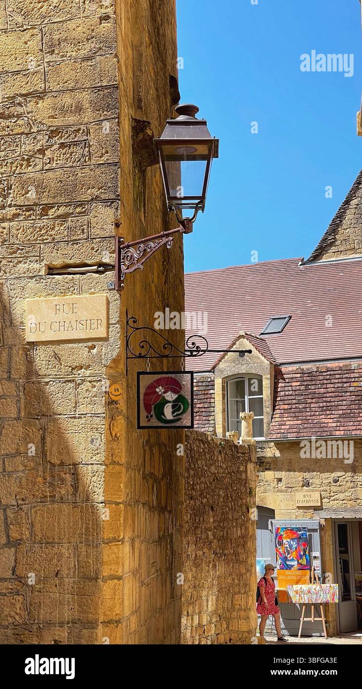 Sarlat, France, unfolds like a timeless postcard, its golden limestone streets and medieval charm inviting exploration into centuries of history Stock Photo