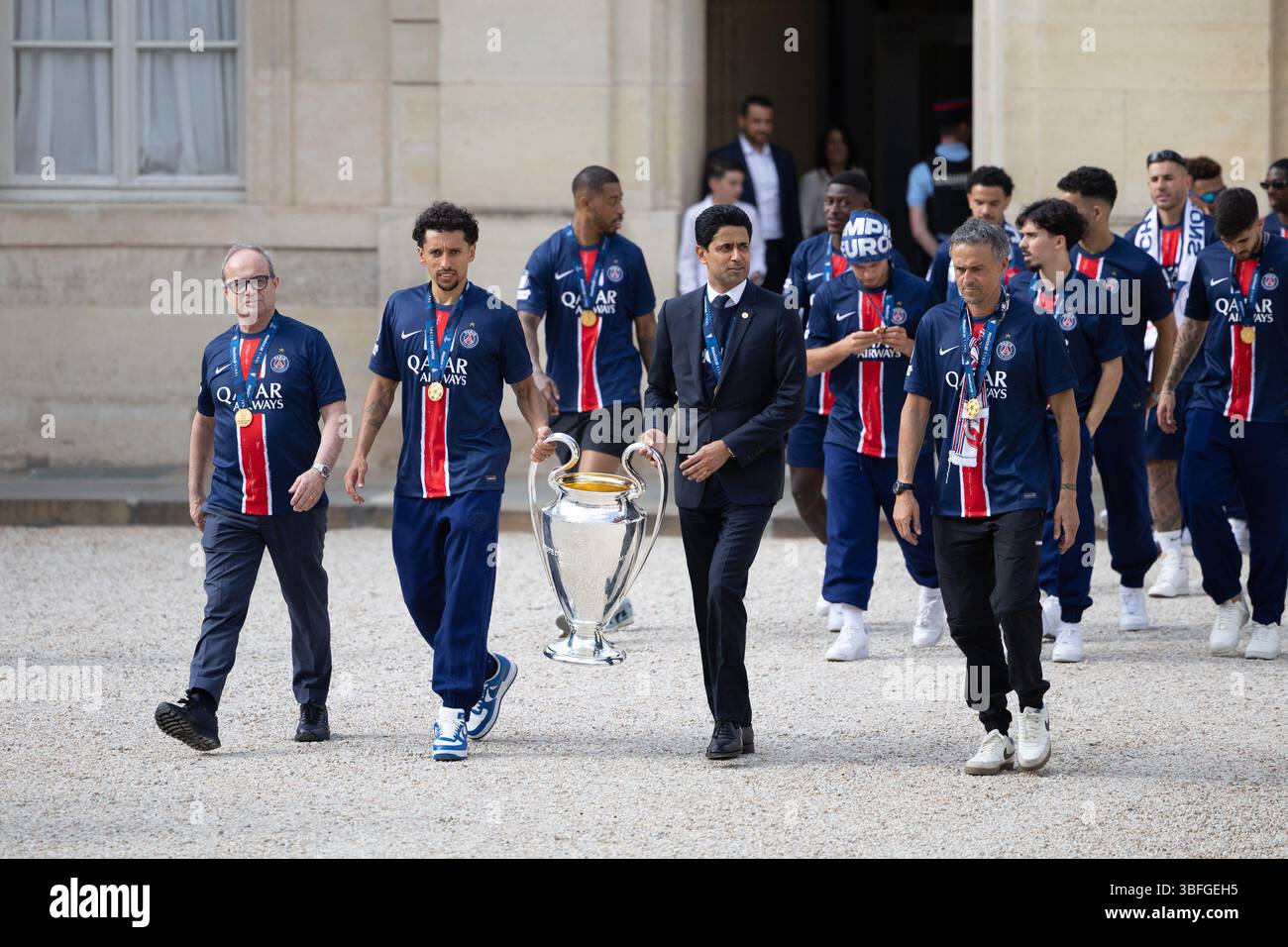 paris-france-01st-june-2025-paris-saint-germains-portuguese-football-advisor-luis-campos-paris-saint-germains-brazilian-defender-05-marquinhos-paris-saint-germains-qatari-president-nasser-al-khelaifi-paris-saint-germains-spanish-coach-luis-enrique-and-psgs-players-arrive-for-a-reception-at-the-elysee-presidential-palace-in-paris-on-june-1-2025-a-day-after-psg-won-the-2025-uefa-champions-league-final-football-match-against-inter-milan-in-munich-photo-by-raphael-lafargueabacapresscom-credit-abaca-pressalamy-live-news-3BFGEH5.jpg