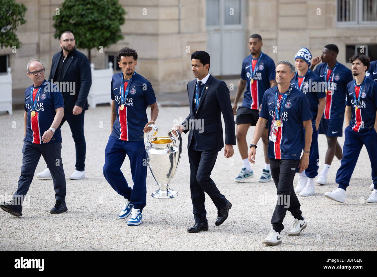 paris-france-01st-june-2025-paris-saint-germains-portuguese-football-advisor-luis-campos-paris-saint-germains-brazilian-defender-05-marquinhos-paris-saint-germains-qatari-president-nasser-al-khelaifi-paris-saint-germains-spanish-coach-luis-enrique-and-psgs-players-arrive-for-a-reception-at-the-elysee-presidential-palace-in-paris-on-june-1-2025-a-day-after-psg-won-the-2025-uefa-champions-league-final-football-match-against-inter-milan-in-munich-photo-by-raphael-lafargueabacapresscom-credit-abaca-pressalamy-live-news-3BFGEJ8.jpg