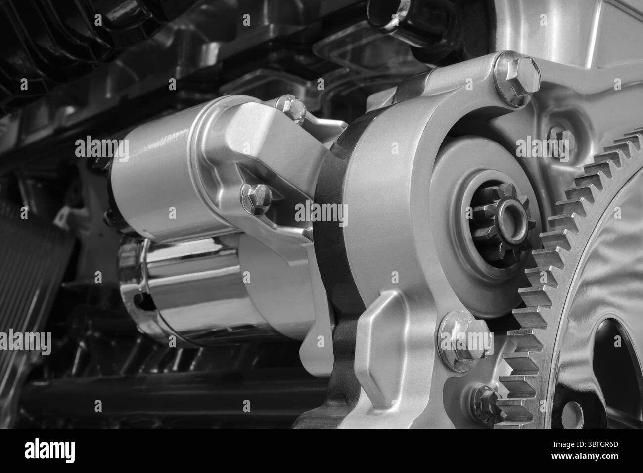 Close up of car engine with starter motor and flywheel gear, auto ...