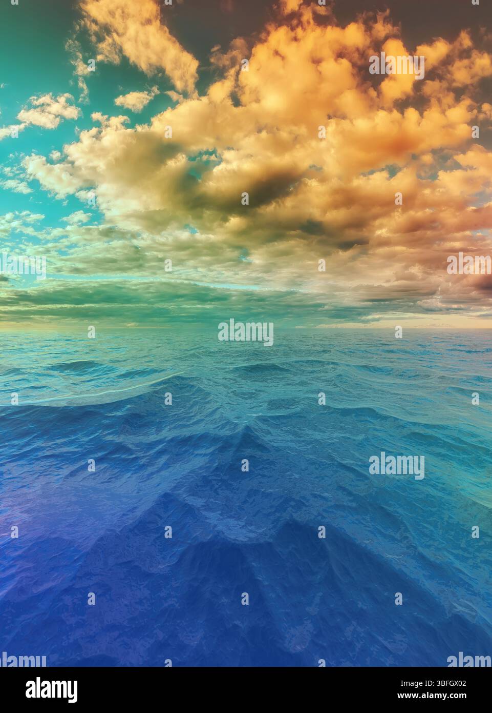 A peaceful seascape with vivid blue water and a dramatic sky of golden clouds at sunset or sunrise Stock Photo
