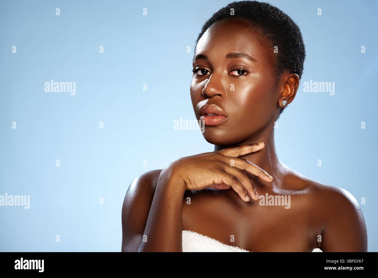 Model poses elegantly against a light blue background showcasing ...