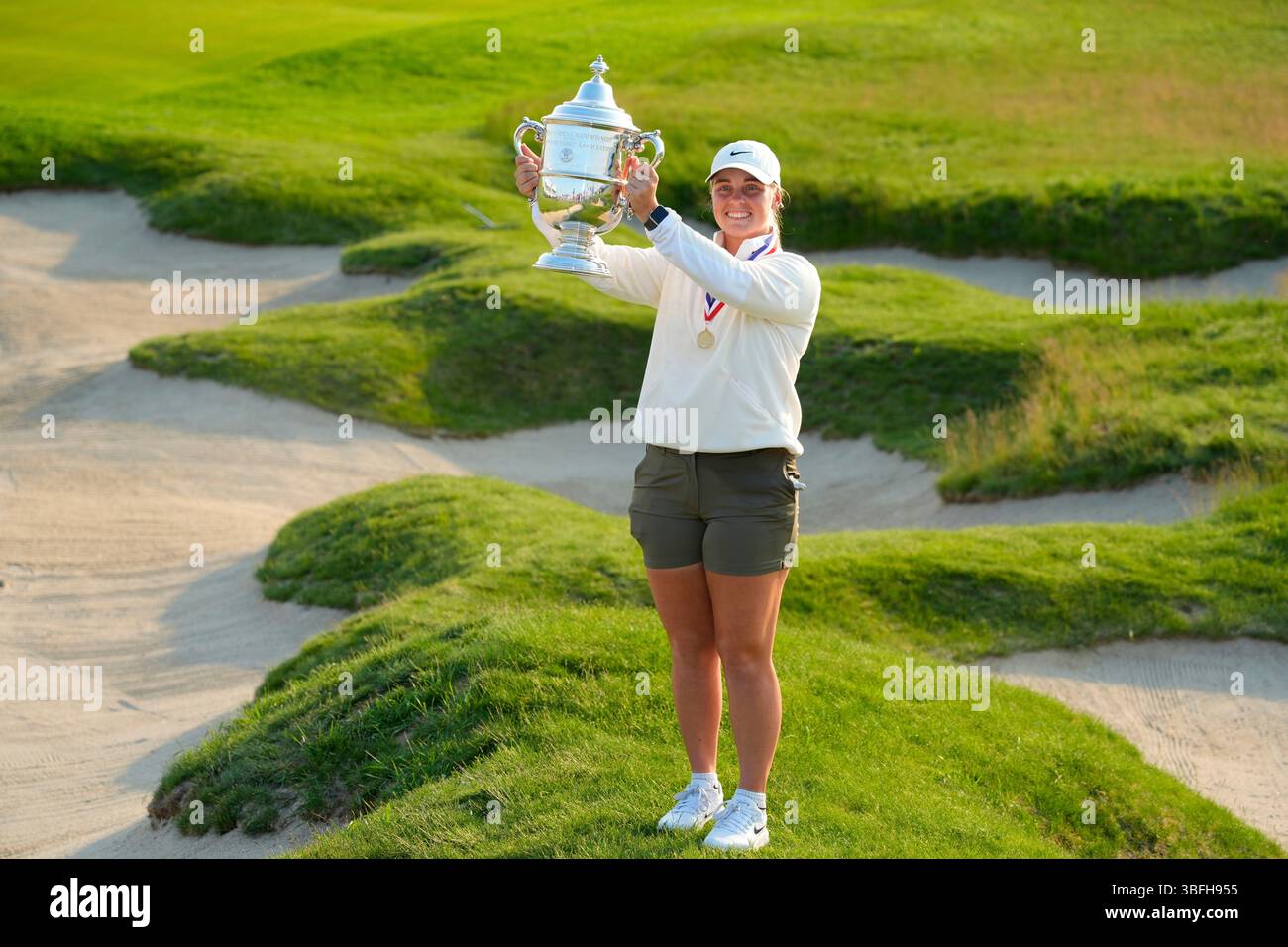 Maja Stark, of Sweden, holds her winning trophy after winning the U.S