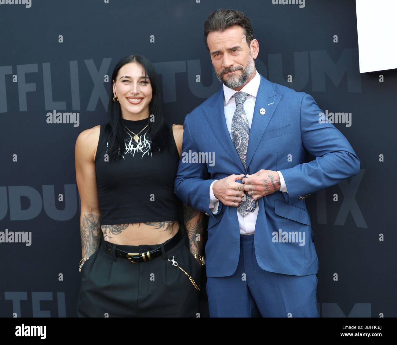 Rhea Ripley, CM Punk at arrivals for Netflix Tudum 2025: The Live Event ...