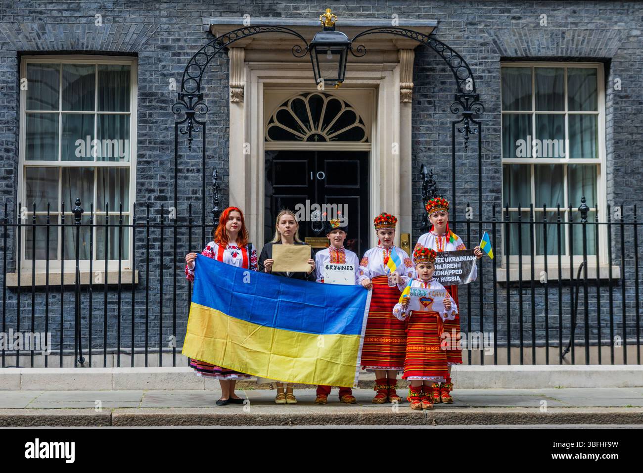 Ukrainian activists and allies protested for the release of Ukrainian children taken to Russia during the invasion of eastern Ukraine. A small group of children went to 10 Downing Street, asking Kier Starmer to raise the issue of the missing children. Stock Photo