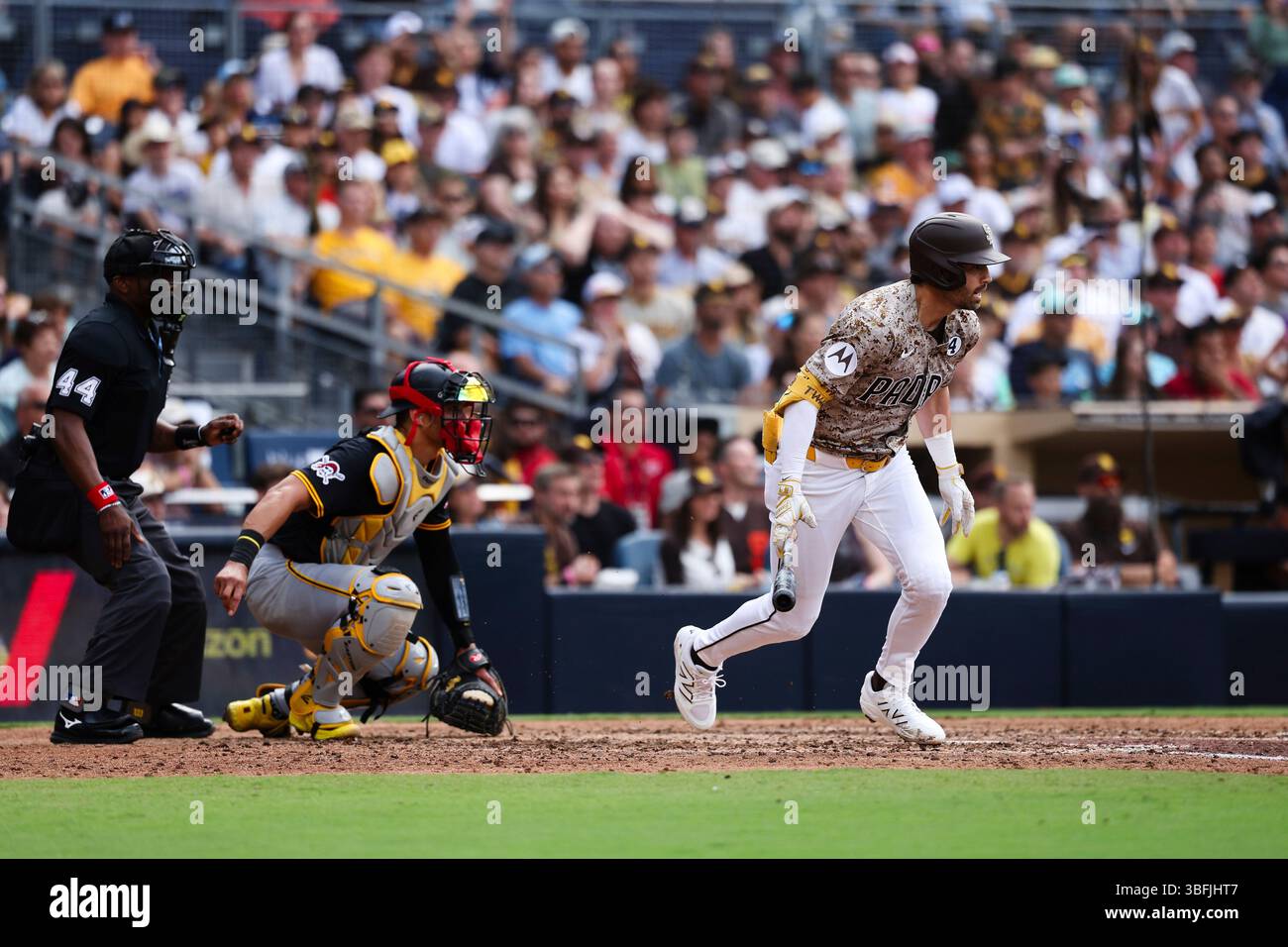 San Diego Padres' Tyler Wade watches watch his rbi single against the ...