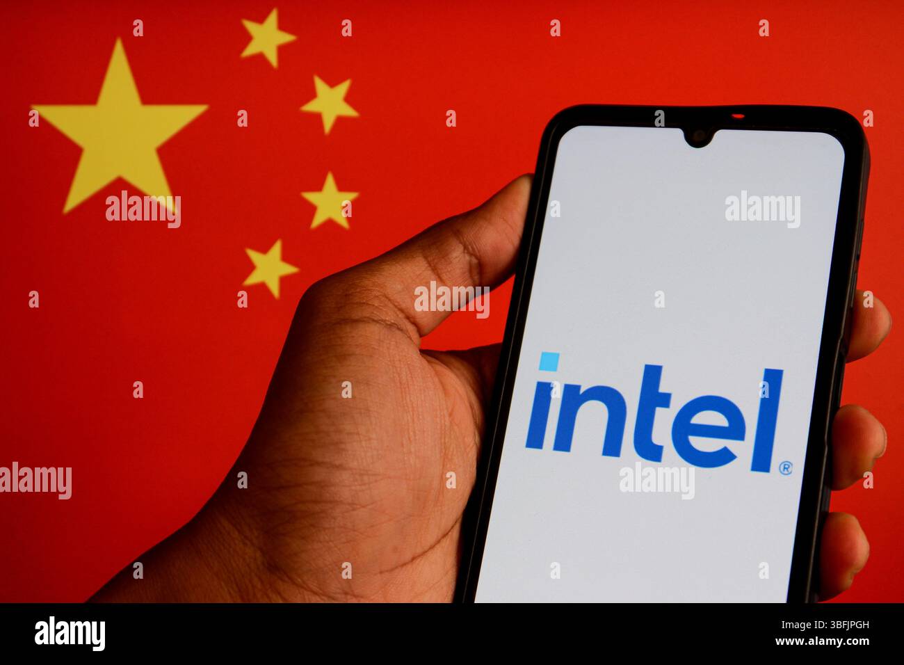 In this photo illustration, the Intel logo seen displayed on a ...