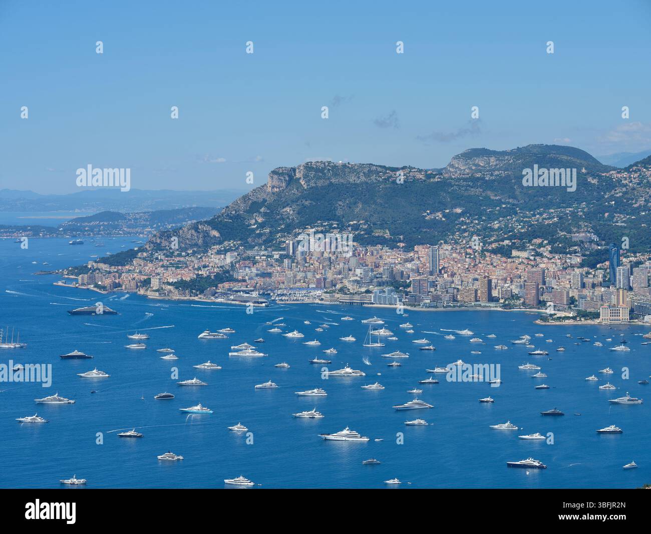 AERIAL VIEW. Numerous mega yachts anchored in the Bay of Roquebrune on ...