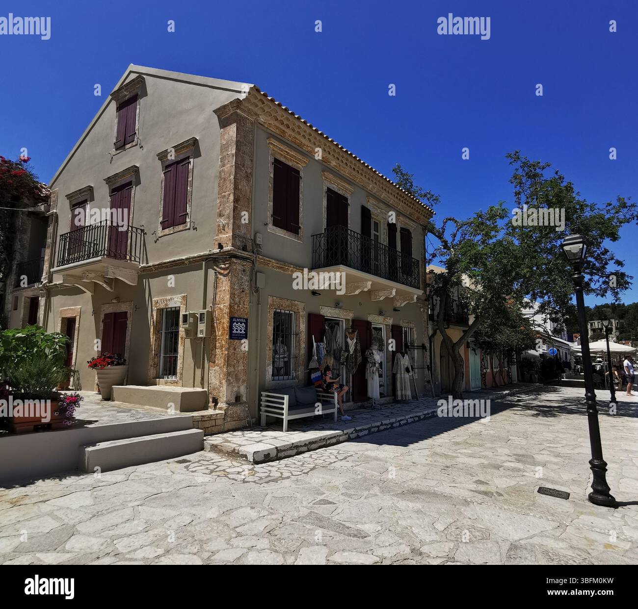 Picturesque Fiscardo harbour village on the Greek island of Kefalonia. - Smartphone Captured Stock Image
