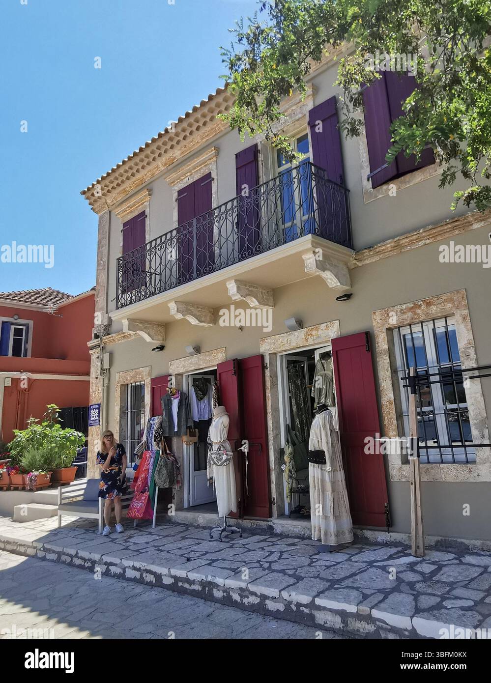 Picturesque Fiscardo harbour village on the Greek island of Kefalonia. - Smartphone Captured Stock Image