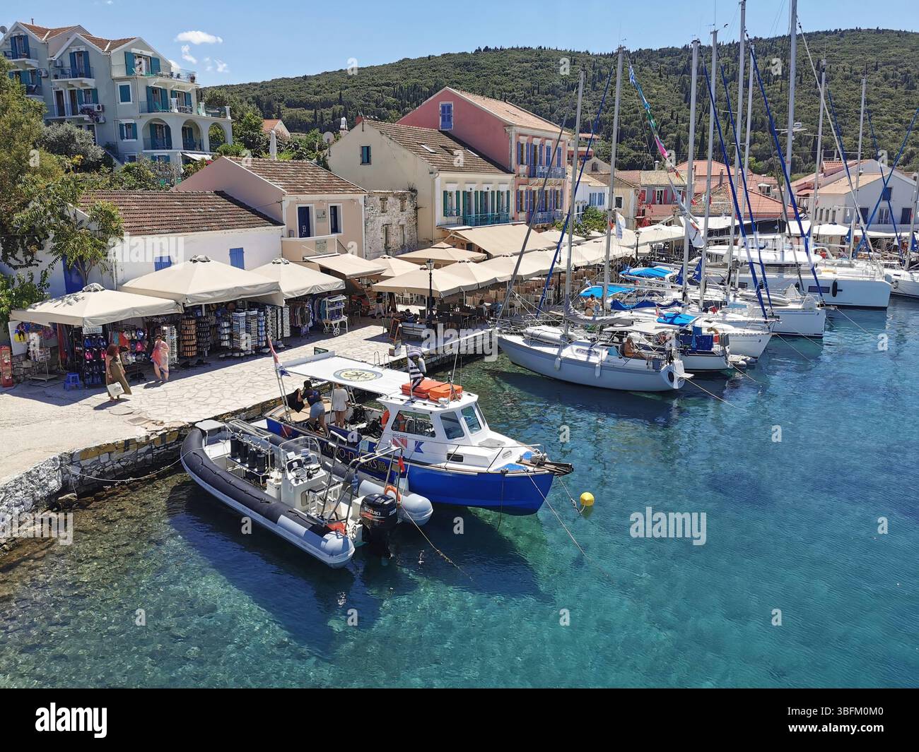 Picturesque Fiscardo harbour village on the Greek island of Kefalonia. - Smartphone Captured Stock Image