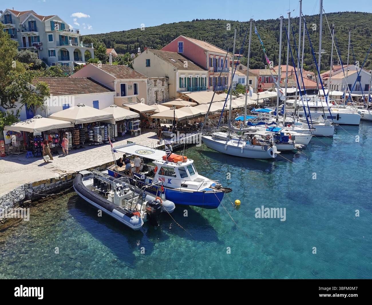 Picturesque Fiscardo harbour village on the Greek island of Kefalonia. - Smartphone Captured Stock Image