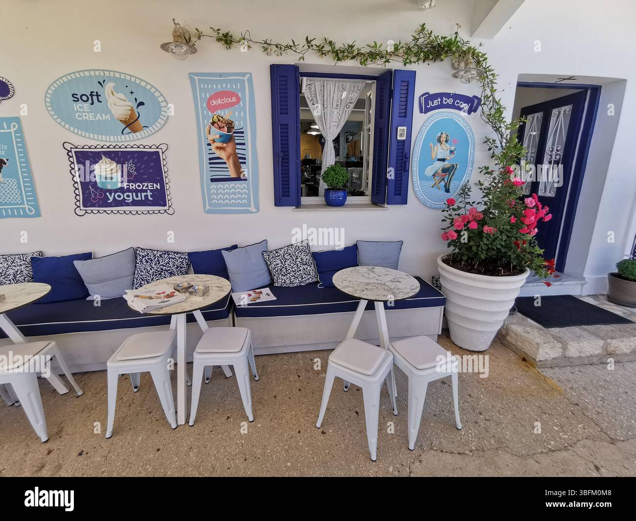 Picturesque Fiscardo harbour village on the Greek island of Kefalonia. - Smartphone Captured Stock Image
