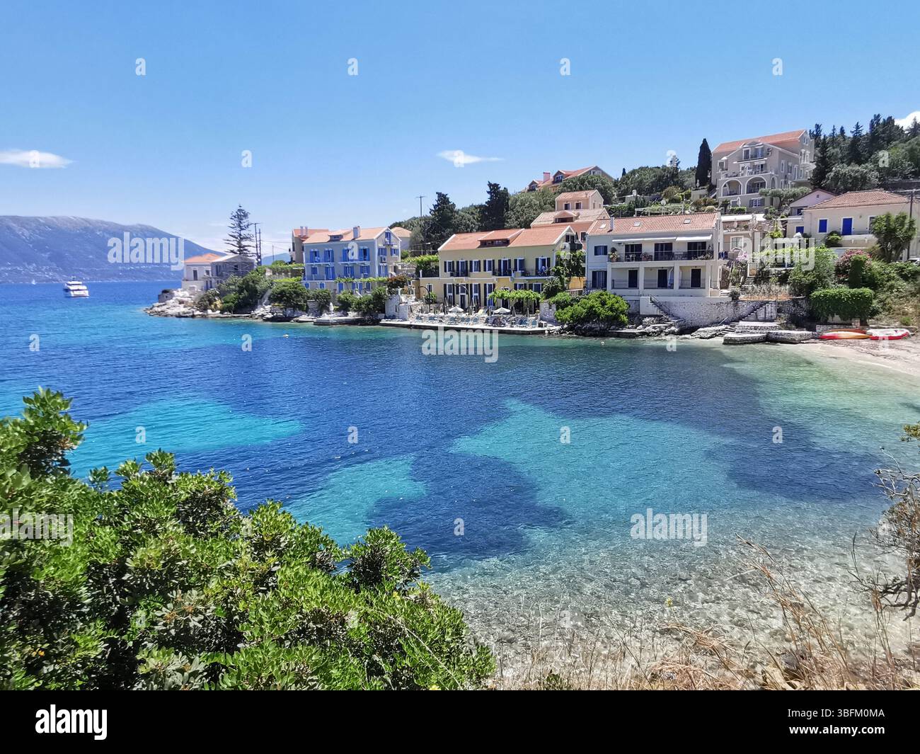 Picturesque Fiscardo harbour village on the Greek island of Kefalonia. - Smartphone Captured Stock Image