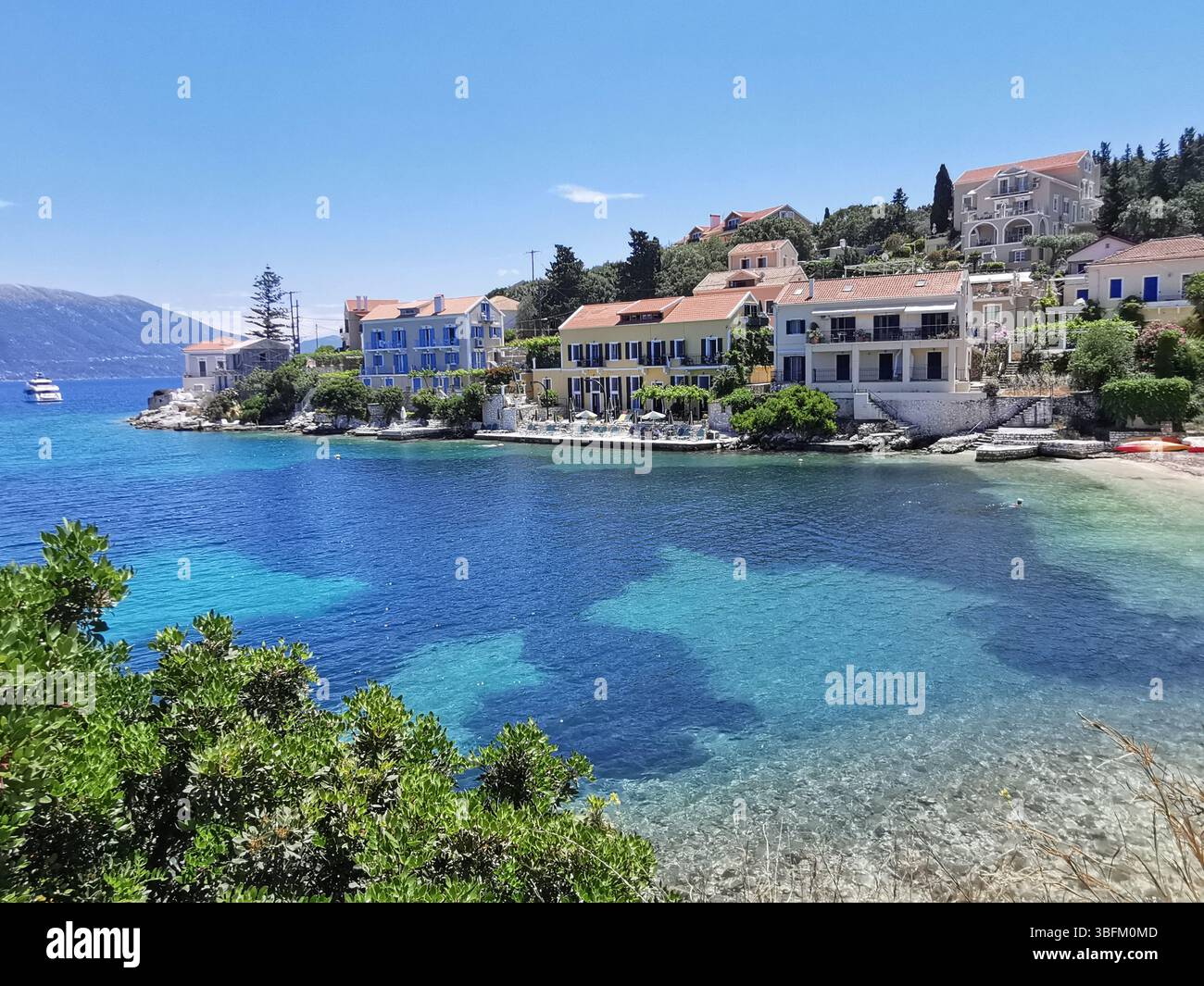 Picturesque Fiscardo harbour village on the Greek island of Kefalonia. - Smartphone Captured Stock Image