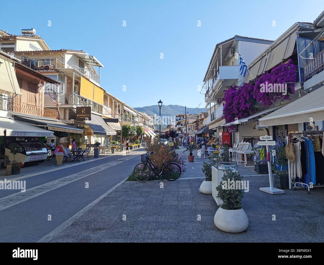 Nydri or Nidri on Lefkada island Greece. A popular tourist resort and harbour it boasts many lively cafes, tavernas and bars. Great stopover for yacht. - Smartphone Captured Stock Image