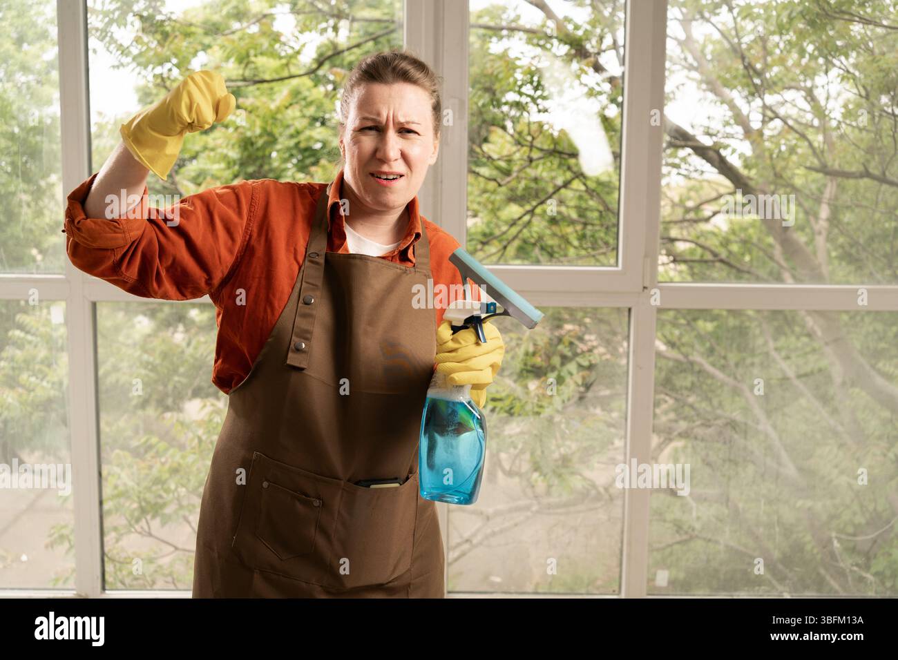 cleaning, housework and housekeeping concept. Angry Aggressive Young ...
