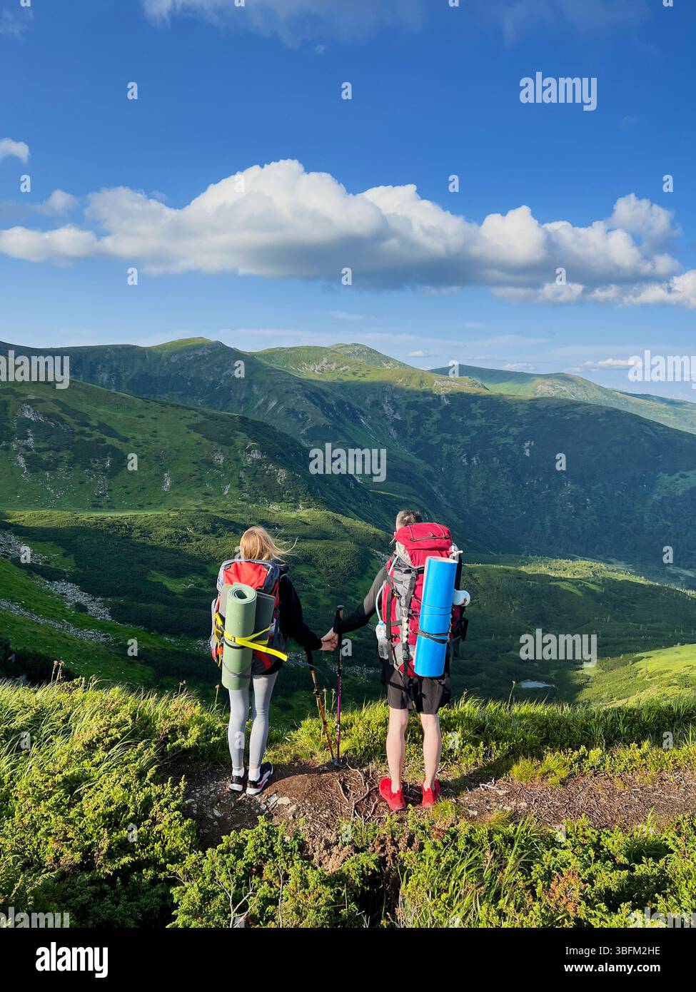 Two hikers stand on rocky hi-res stock photography and images - Alamy