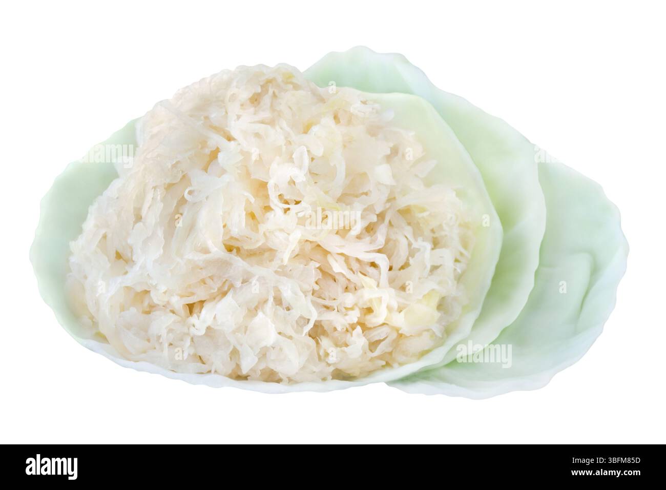 Sauerkraut and cabbage leaves isolated on white background Stock Photo
