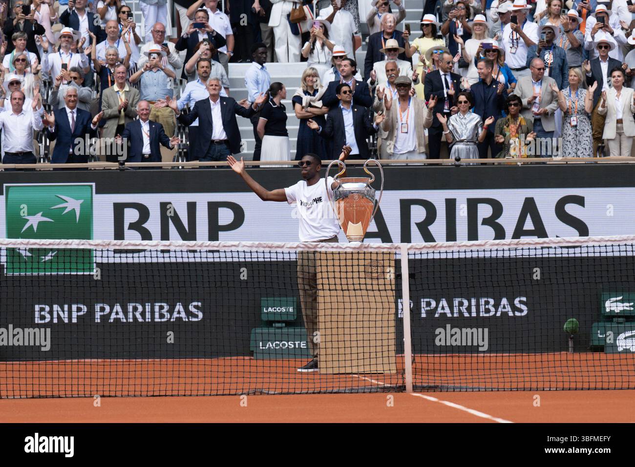 Ousmane Dembele of Paris Saint Germain with the UCL Trophy during