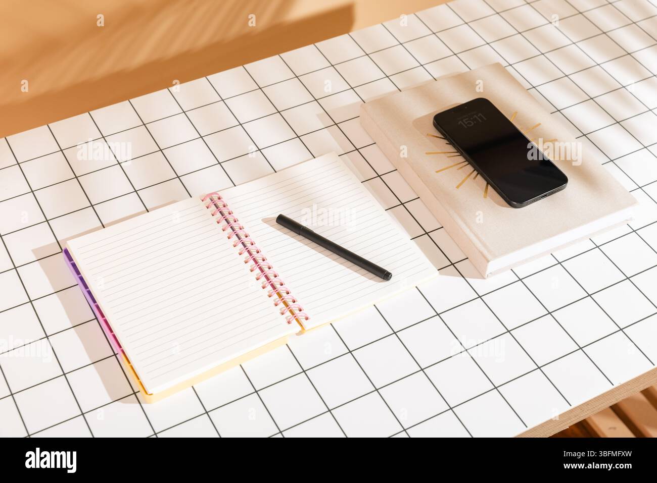 A clean and organized top-view image of a modern desk setup, featuring ...