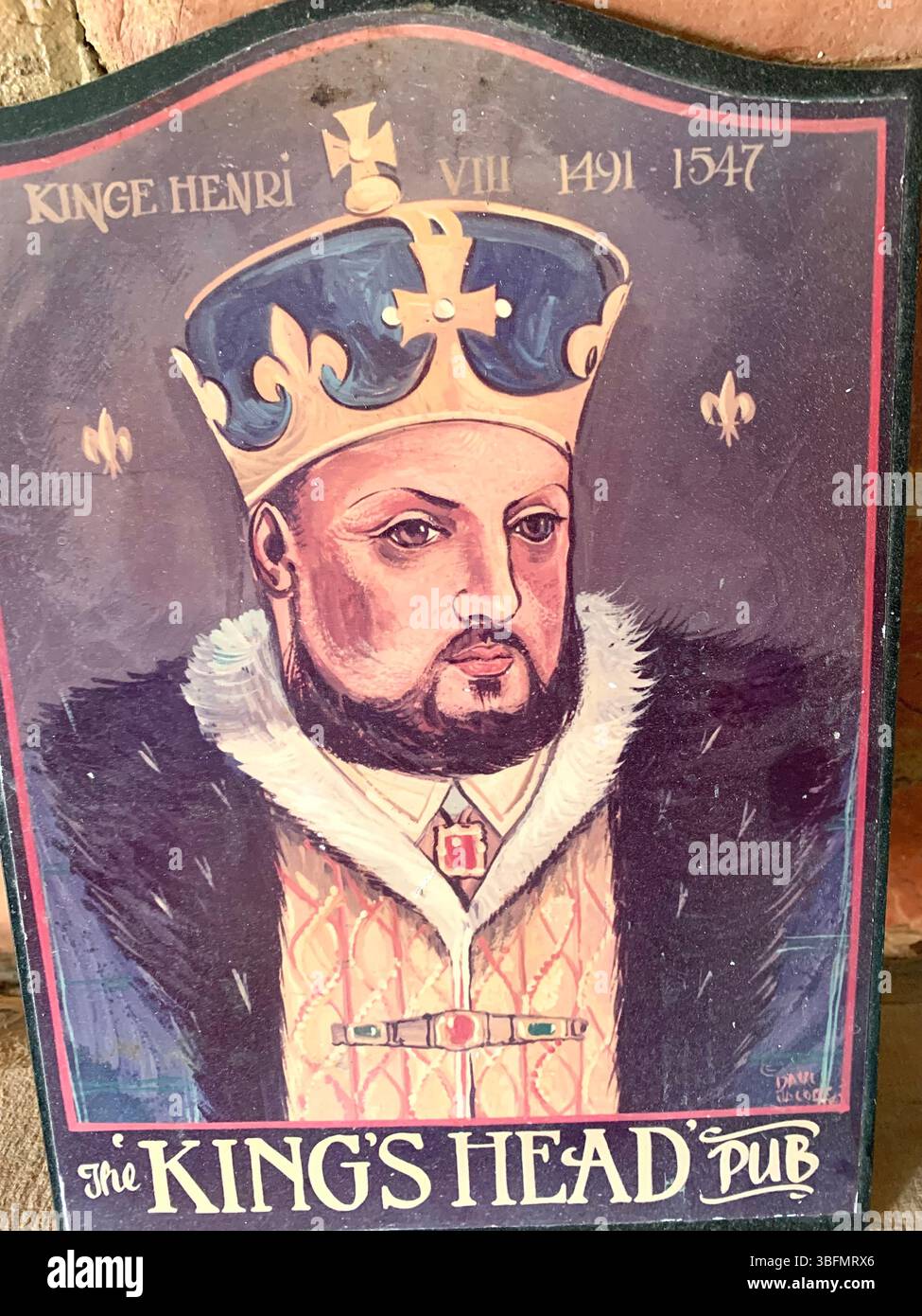 Kings head Henry the eighth wearing a crown in Harpole Northampton Northamptonshire England Monarch costume beard gold golden beard King Stock Photo